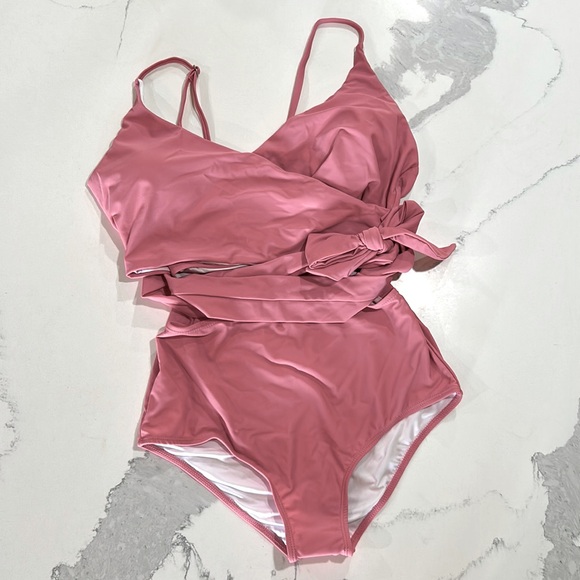 Adorable new never worn pink cut out one piece swimsuit. - Picture 6 of 9